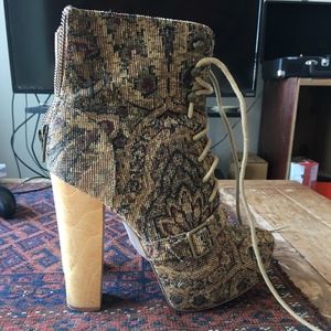 High heel lace up boots